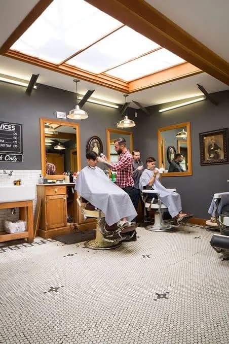 Barbers at work under the skylight